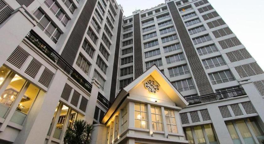 Grand Darmo Suite by AMITHYA - Surabaya